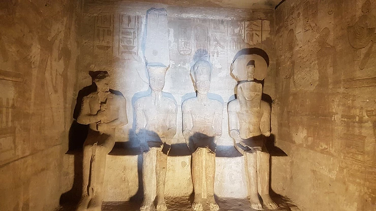 Ramesses II is seated with three other gods, Ra-Harakhty, Amun and Ptah.