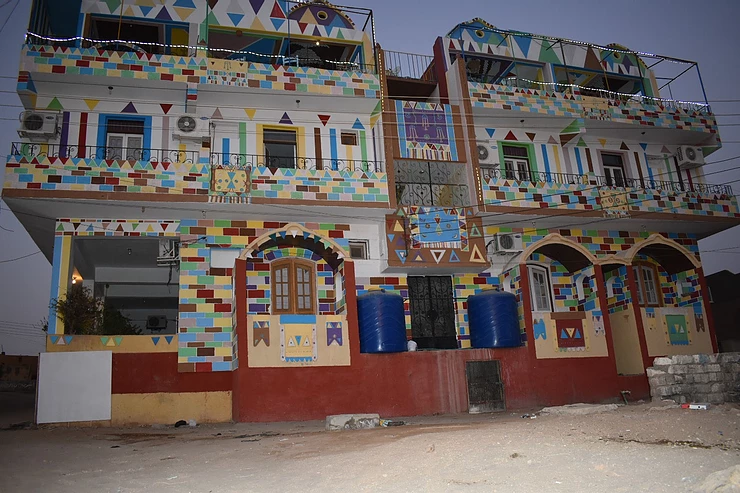 Brightly coloured house in house in the Nubian Village, Aswan