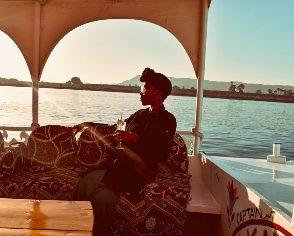 Solo female travel in Egypt - lady on Nile boat