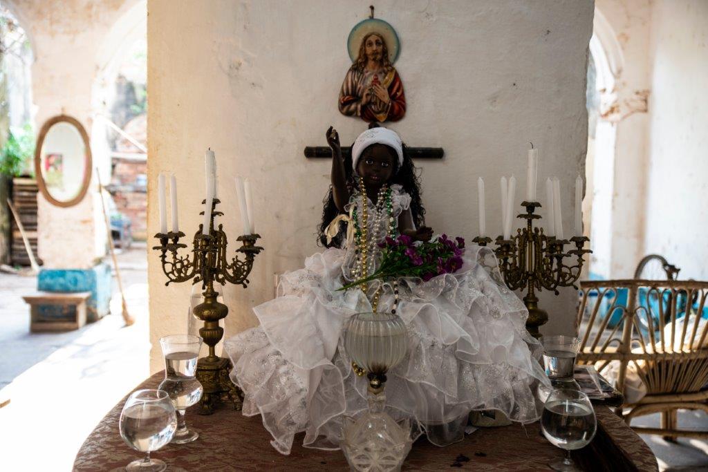 Outdoor New initiate to Santería display in Trinidad, Cuba