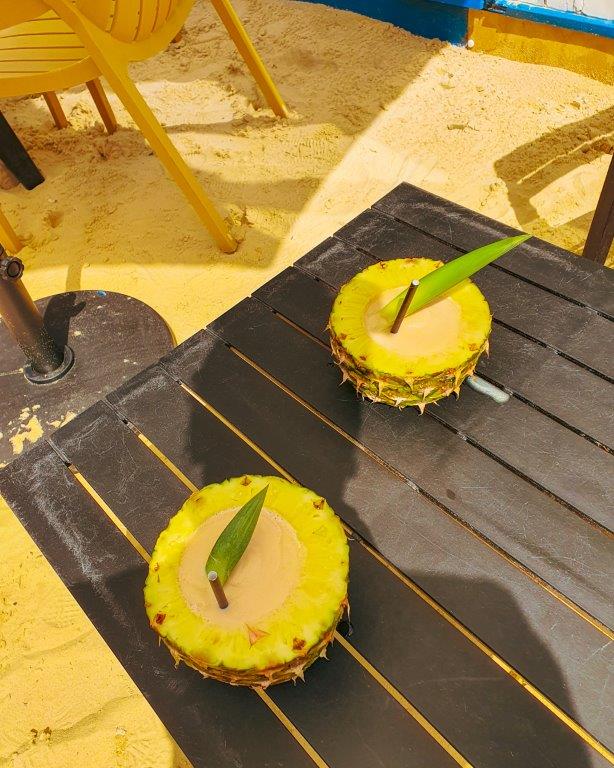 Limin' at Limin' Beach Club - Pina Coladas on the beach