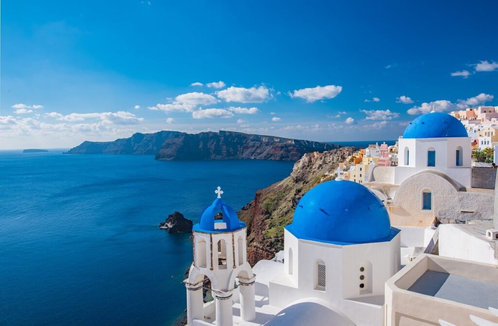 Best Destinations for Solo Female Travel - Santorini's blue domed roofs