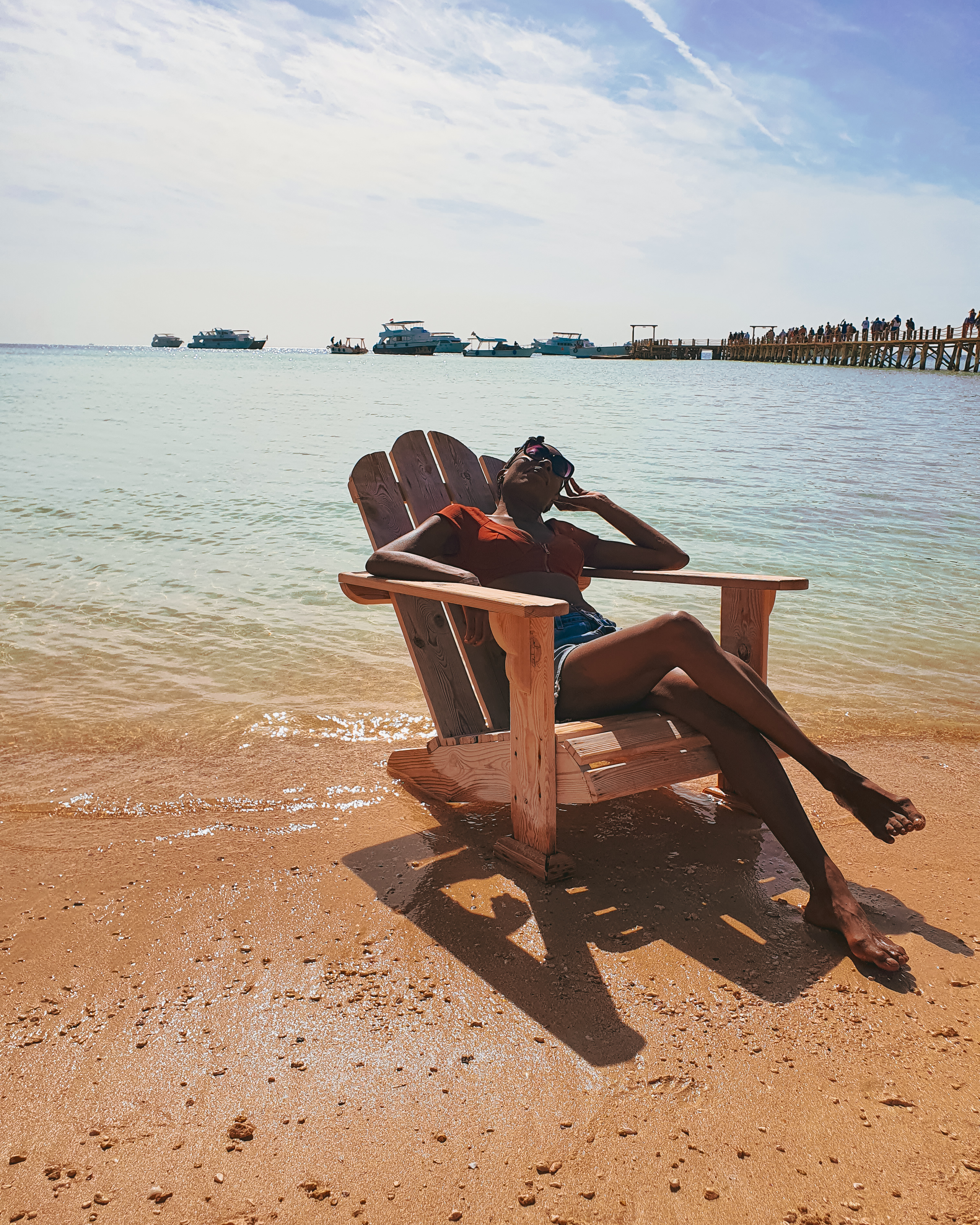 Reasons why you should travel solo - sat in chair on beach at Orange Bay, Hurghada