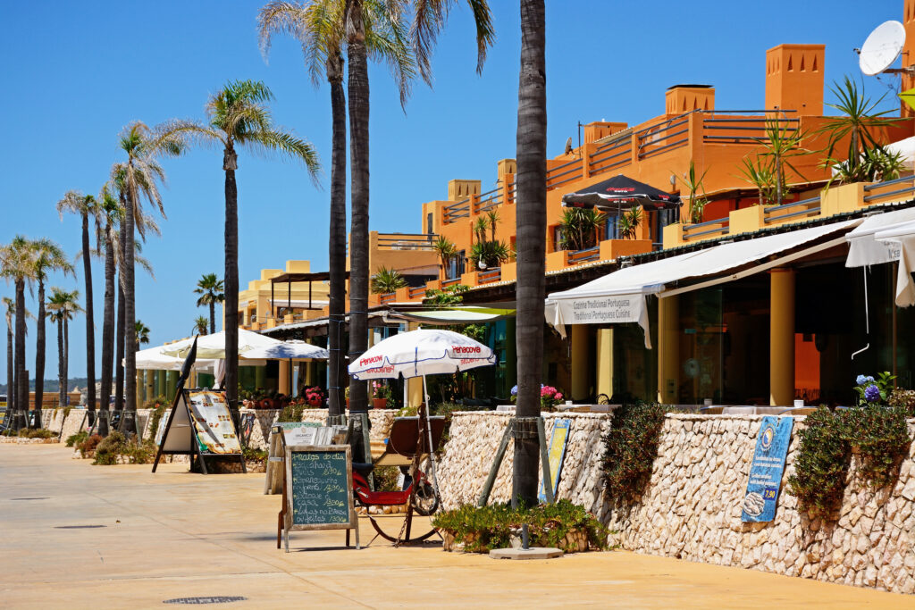 Row of waterfront restaurants by the marina and beach,  Portimão 